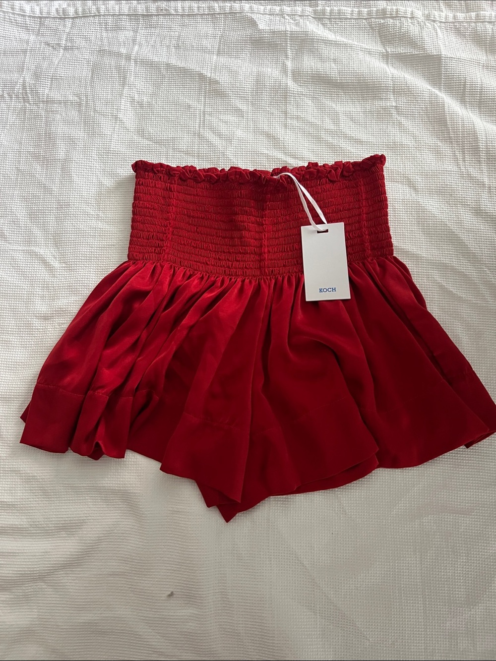 KOCH Red Smocked Waist Shorts NWT in the color Hot Tamale